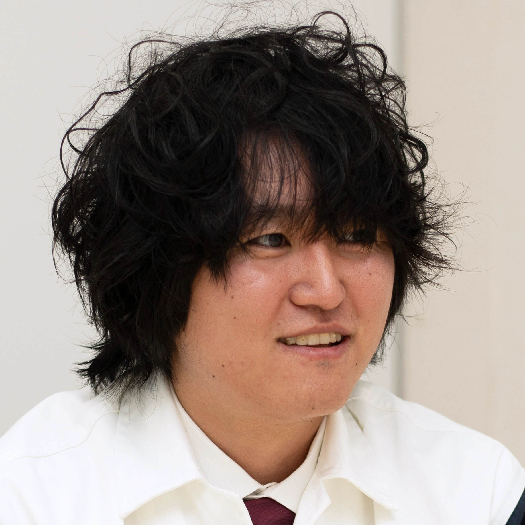 Photo of Tanaka, who is Responsible for system development