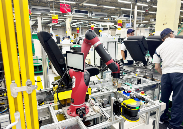 Production line where humans and robots coexist