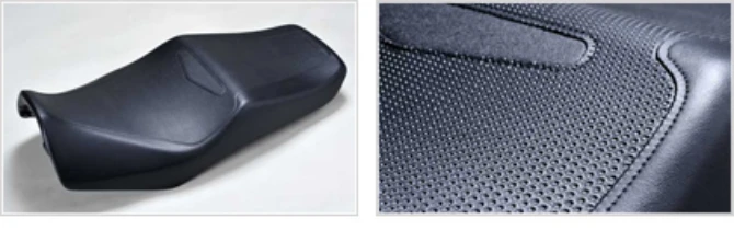 Enlarged photo of a motorcycle seat and real stitching.