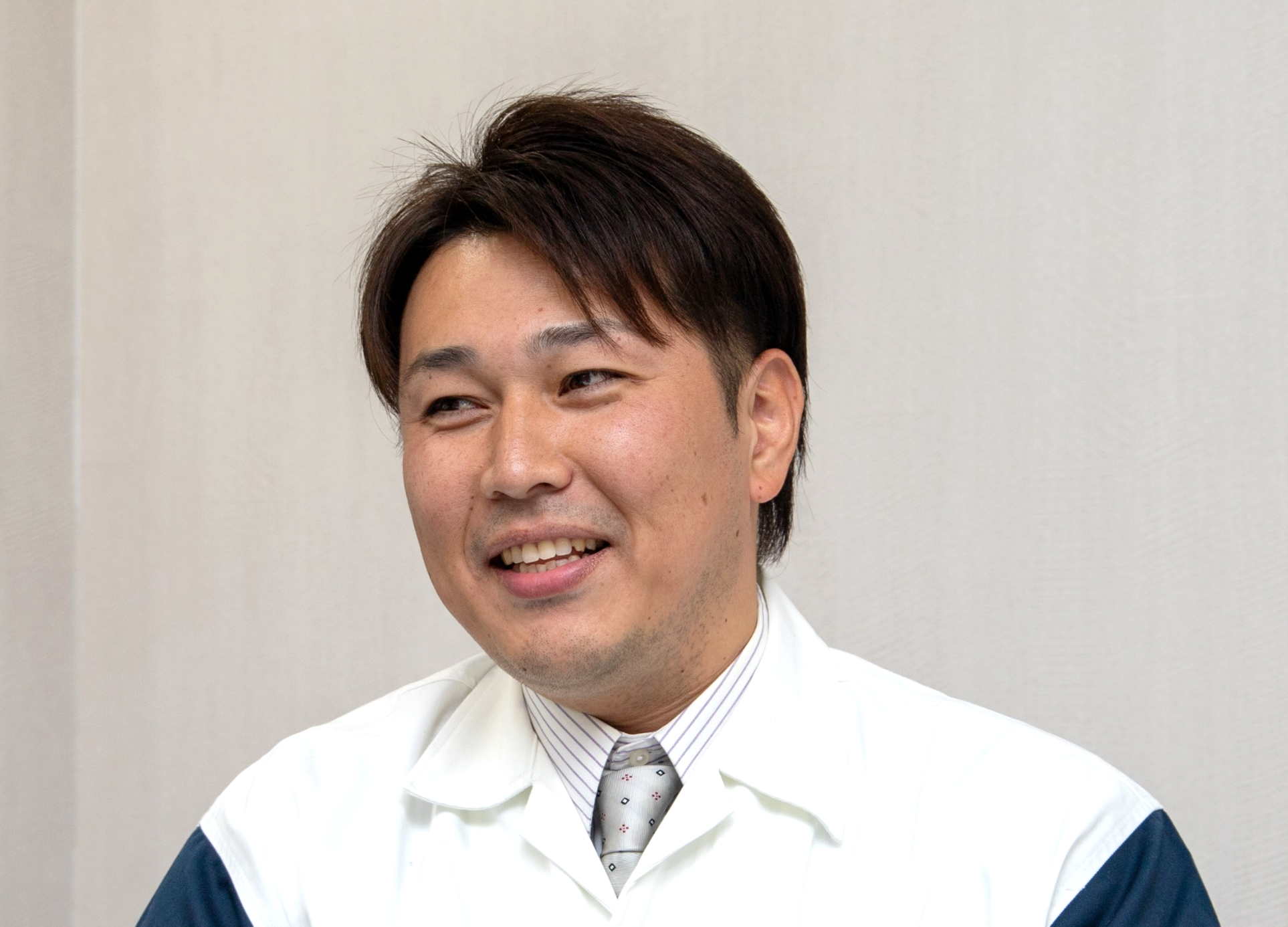 設計PL（プロジェクトリーダー）である會田の写真